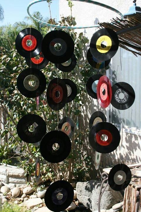 a wind chime made out of old records