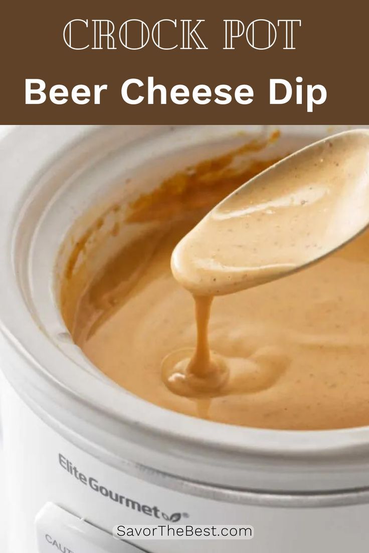 a spoon full of beer cheese dip in a crock pot with text overlay