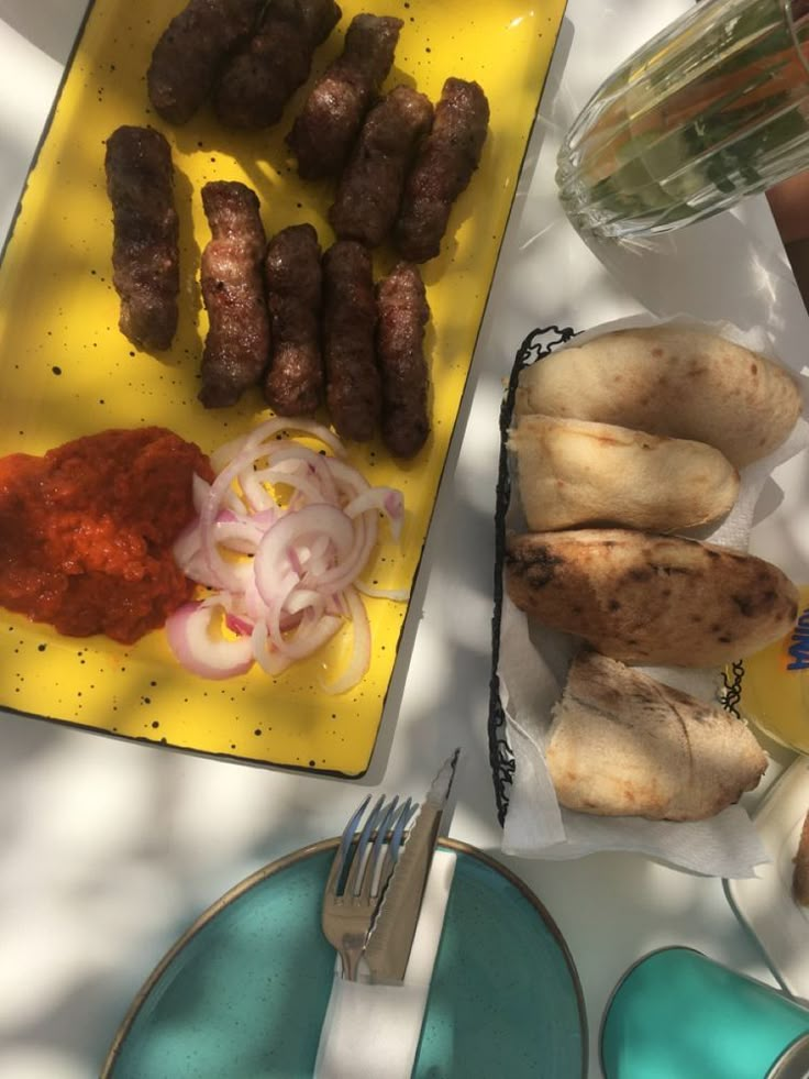 some food is laying out on a yellow plate