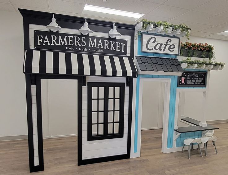 two booths are set up in the middle of a room