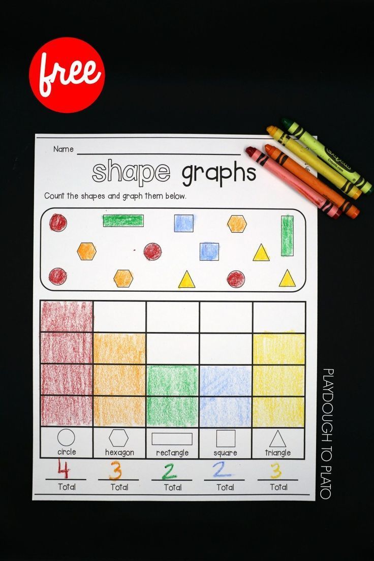 a printable worksheet with crayons and colored pencils next to it