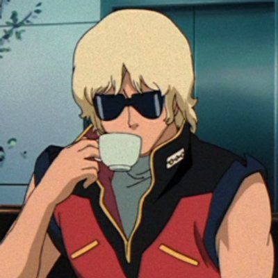 a man with blonde hair and sunglasses drinking from a cup