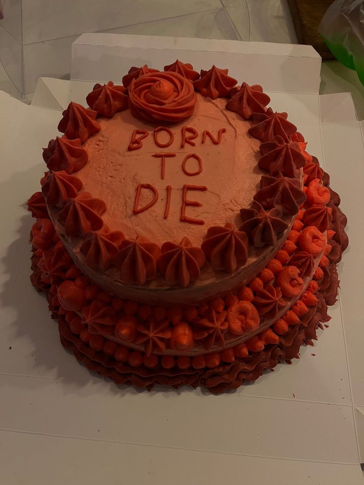 a cake that has been decorated with the words born to die