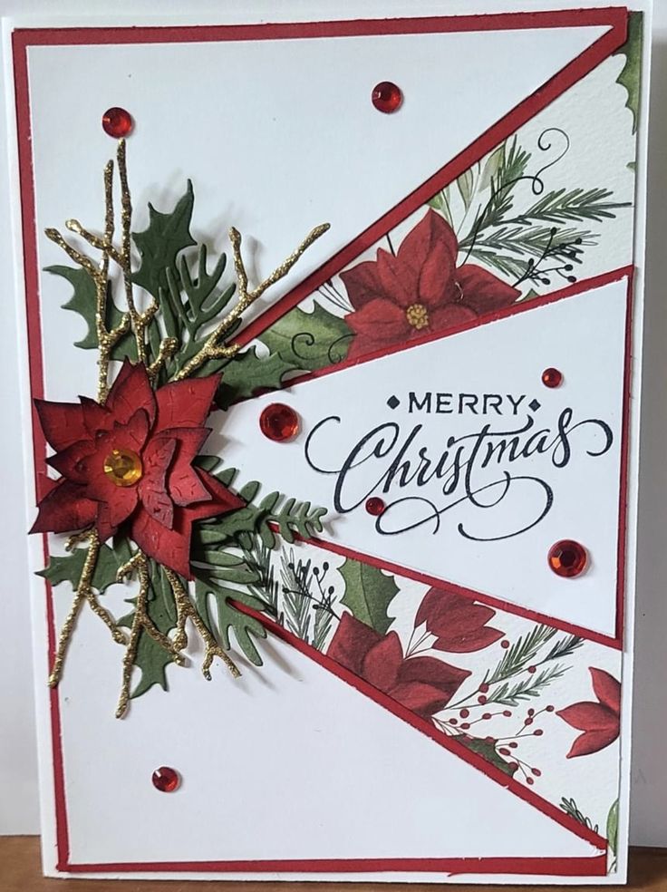 a christmas card with poinsettis and holly