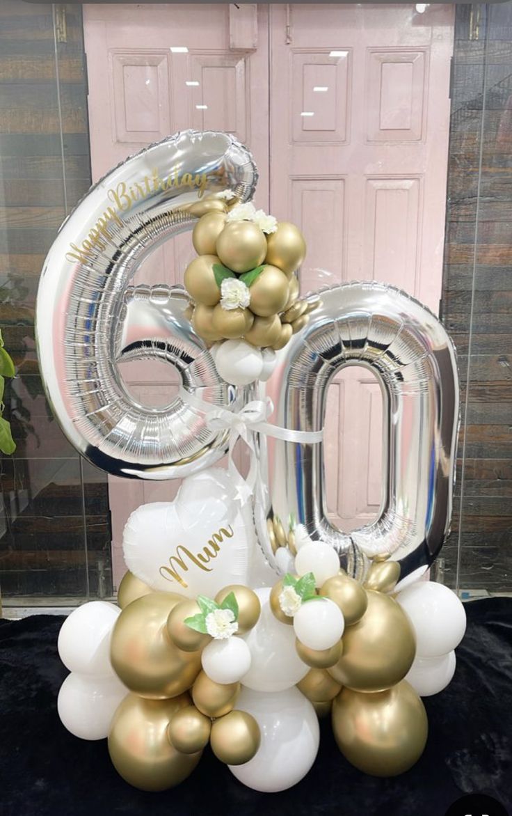 the balloon numbers are all gold and white