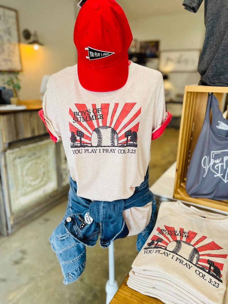 the back of a person's shirt and jeans on display in a store window