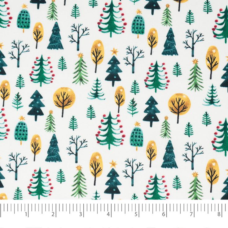 a white background with trees and snowflakes on the bottom, in front of a ruler