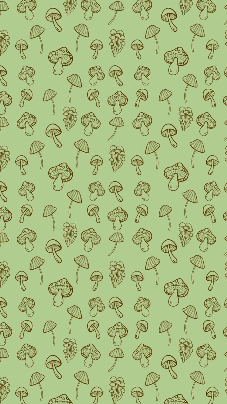 a green background with brown mushrooms on it