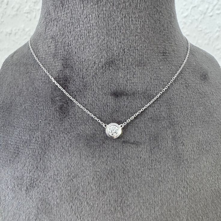 This elegant 45 cm necklace made of 14k white gold is adorned with a natural 0.16-carat diamond. The purity and brilliance of the stone in a stylish setting give this piece sophistication and refinement. Perfect for everyday wear, it will be a subtle accent to your look. PLEASE NOTE: If you place an order outside the European Union, local duties may apply. I am not responsible for covering these fees, and they are not included in the listed price. Please check with your customs office for possib Elegant Silver Solitaire Necklace With Single Cut Diamonds, White Gold Necklaces With Single Cut Cubic Zirconia, Formal Silver Diamond Necklace With Single Diamond, Timeless Silver Solitaire Diamond Necklace, White Solitaire Necklace With Diamond Accents And Round Pendant, Silver Solitaire Necklace With Diamond Accents In Platinum, Silver Solitaire Necklace With Round Diamond Pendant, Silver Platinum Solitaire Necklace With Diamond Accents, Timeless Silver Round Cut Diamond Necklace