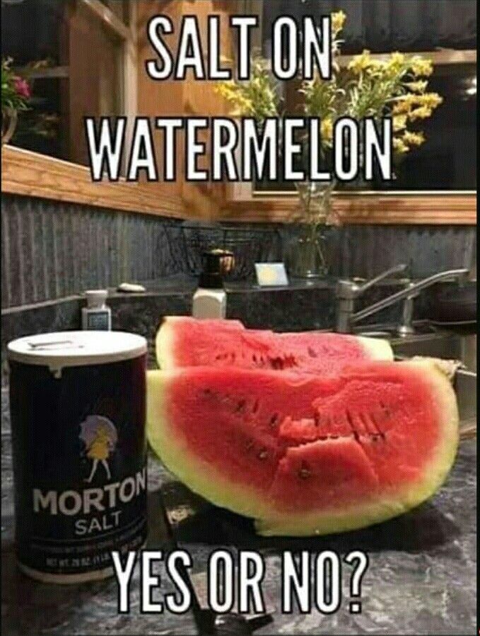 a can of watermelon sitting on top of a counter next to a slice of watermelon