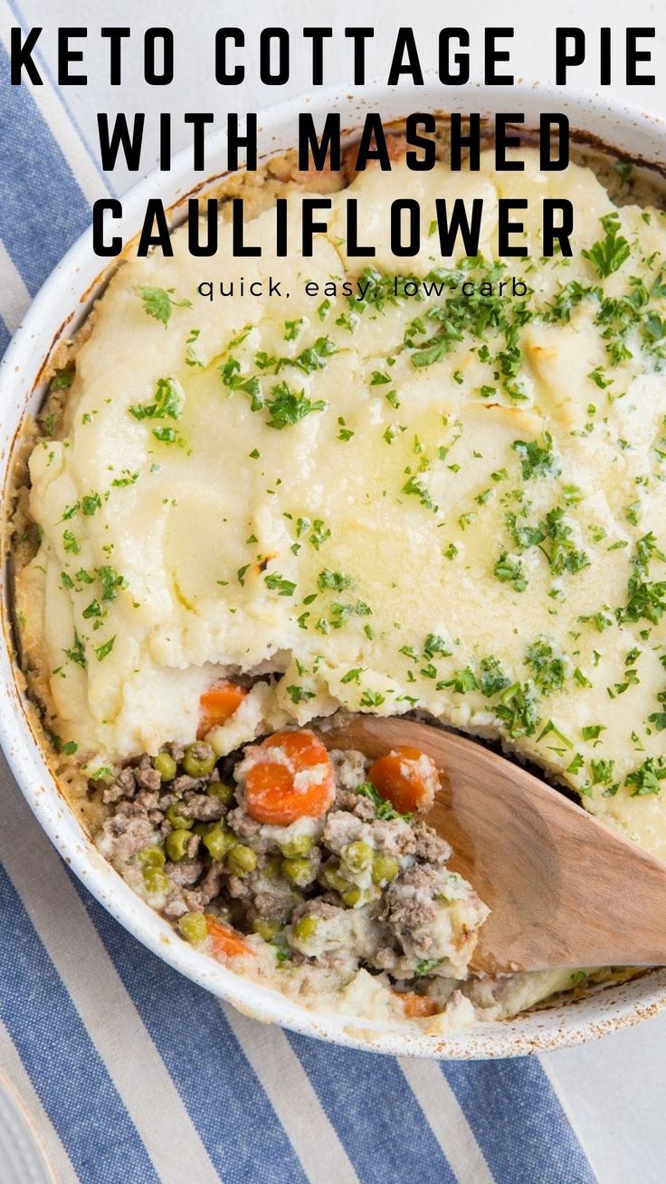 a casserole dish with mashed cauliflower and carrots in it