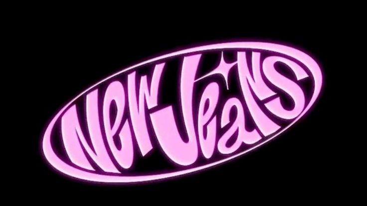 the new york jets logo is lit up in pink and purple colors on a black background