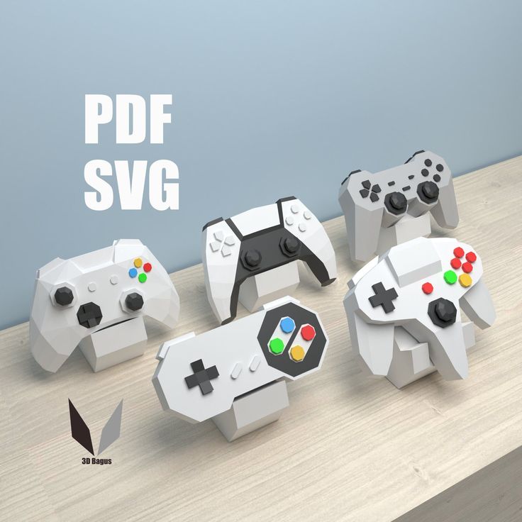 several different video game controllers sitting on top of a wooden table next to each other