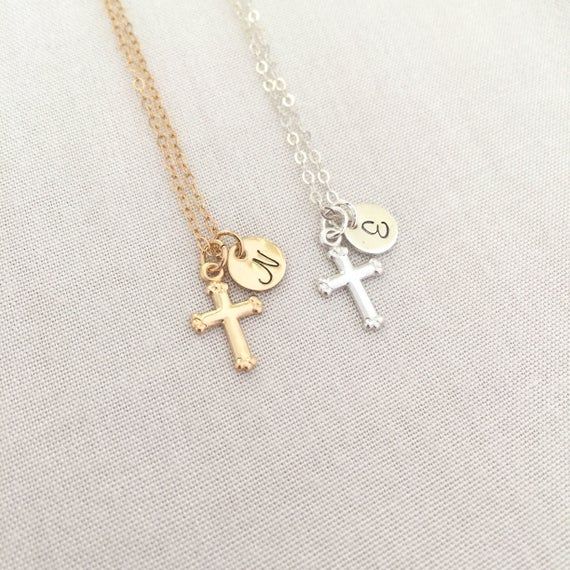 Hand Stamped Cross Necklace, Baby Christening Necklace, Personalized Baptism Necklace, First Communion Gift, Baby Boy Necklace, Simple CrossAvailable in Sterling Silver and 14K Gold FilledSpecification. All component is Sterling Silver or 14K Gold Filled. Disc size 7mm. Cross size 8.5 x 11mm. Comes in a satin pouch. Length includes jump ring and claspPLEASE leave instruction of initial in the note box at checkout.ie. NIMPORTANT:Usually jewellery in the pictures looks bigger than in reality.Pleas Customizable Gold Jewelry For First Communion, Dainty White Jewelry For Baptism, Personalized Jewelry For Baptism And Mother's Day, Sterling Silver Jewelry For Baptism, Dainty Adjustable Jewelry For Baptism, Silver Dainty Jewelry For Baptism, Dainty Silver Jewelry For Baptism, Personalized Dainty Jewelry For First Communion, Dainty Personalized Jewelry For First Communion