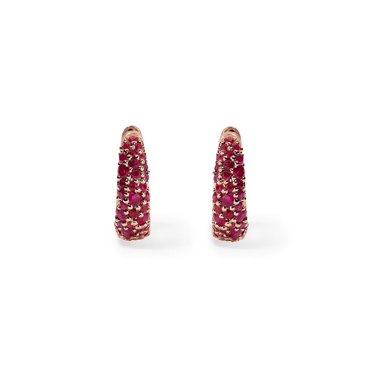 A classic twist on the pave huggie earring for a timeless accessory that embodies understated refinement. Crafted from gleaming gold and sparkling Rubies, these earrings feature a snug, hoop-like design that "hugs" the earlobe closely. Their simplicity and versatility make them an essential addition to any jewelry collection, effortlessly complementing both casual and formal looks. Available in 14K White, Yellow, and Rose Gold Ruby weight = 0.53 carats Inner Diameter = 9mm x 8mm Sold as a pair Formal Fine Jewelry Huggie Earrings With Gemstones, Formal Sparkling Stone Huggie Earrings, Formal Huggie Earrings With Sparkling Stones, Elegant Huggie Earrings With Sparkling Stones, Elegant Diamond Huggie Earrings With Pave Setting, Elegant Gemstone Huggie Earrings For Formal Events, Elegant Gemstone Huggie Earrings For Formal Occasions, Elegant Formal Huggie Earrings With Gemstone, 14k Gold Earrings With Sparkling Stones For Formal Events