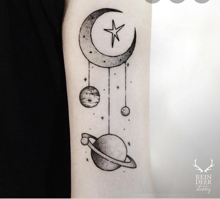 a black and white tattoo with an image of the moon, planets and stars on it