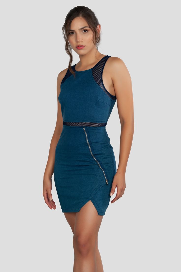 Too Much Fun Medium Wash Denim Mini Dress Model is 5'8" tall, 34" Chest, 25" waist and 34" hips and wearing a size small Style No. CL000018 Color: Denim Blue