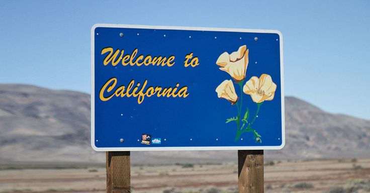 a welcome to california sign in the desert