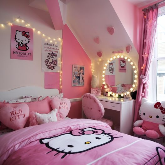 a bedroom decorated in pink and white with hello kitty decorations