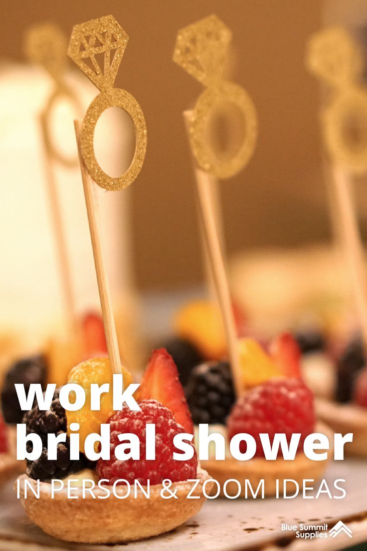 an advertisement for a bridal shower with fruit on skewers and gold rings