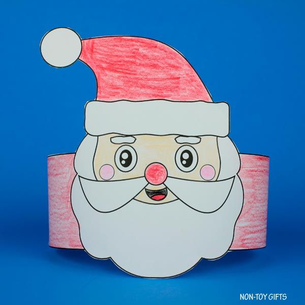 a paper santa claus head on a blue background