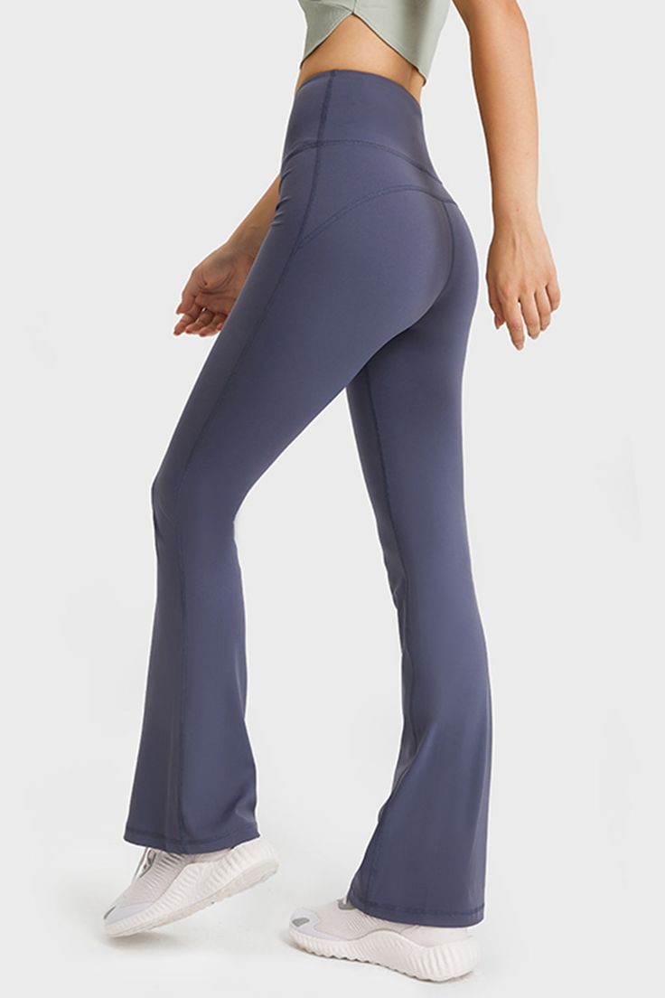 These yoga pants are made of a thin and highly stretchy material that feels like skin. The long length of these pants is perfect for yoga and other activities. The elastic waistband provides a flattering and comfortable fit. Sizing category: Regular Picture style: Studio Pattern type: Solid Features: Feel like skin Length: Long Material: 80% nylon, 20% spandex Stretch: Highly stretchy Sheer: No Body: Not lined Care instructions: Hand wash cold. Do not tumble dry. Imported Product measurements: 4 Flare Yoga Pants, Picture Style, Gym Pants, Bondi Beach, Flare Leggings, British Indian, Brunei, Yoga Fitness, Yoga Pants