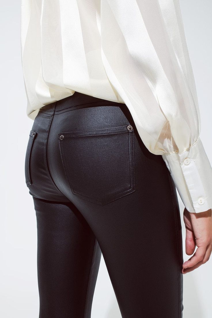 Introducing our Black Gloss Look Pants with Stretchband – a sleek and urban addition to your wardrobe. These super skinny pants feature a metallic finish, adding a touch of modernity to your look.  Crafted from 100% polyester, the glossy appearance and metallic sheen give these pants a standout urban aesthetic. The elastic waist ensures both comfort and a snug fit, making them an ideal choice for various occasions.  The super skinny fit, high waist, and standard length contribute to a flattering silhouette that complements different body types. Please note that these pants run small, so it's recommended to size up. The S-M-L sizing corresponds to US sizes 2, 4, and 6 respectively.  Our model, with measurements of 32-23-35 and a height of 5', wears size S, showcasing the super skinny fit an Sleek Fitted Metallic Bottoms, Sleek Metallic Bottoms, Sleek Tapered Leg Leather Pants For Work, Sleek Tapered Leather Pants For Work, Elegant Bottoms With Standard Cut Leg For Fall, Elegant Bottoms With Standard Cut For Fall, Sleek High-waisted Leather Pants, Sleek Mid-rise Leather Pants For Work, Modern Metallic Bottoms For Party