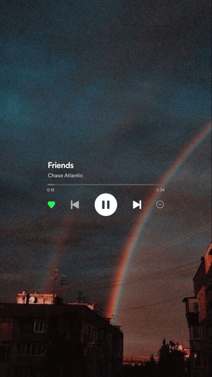 an image of a rainbow in the sky with music player on it's screen