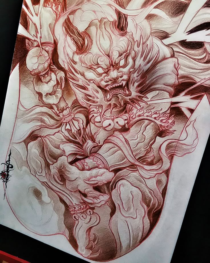 a drawing of a demon with red ink on paper