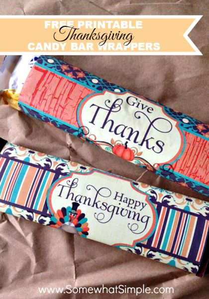 two candy bars with the words give thanks and happy thanksgiving written on them in different colors