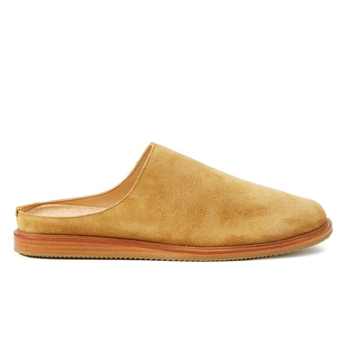 Heritage-style suede mules built for all-day comfort Modern Suede Slip-ons With Cushioned Footbed, Comfortable Slip-on Suede Slippers, Suede Slip-ons With Suede Lining And Closed Toe, Casual Suede Slip-ons With Suede Lining, Suede Slip-ons With Suede Lining, Classic Suede Mules For Spring, Beige Suede Casual Clogs, Casual Beige Suede Clogs, Beige Suede Mules With Suede Lining