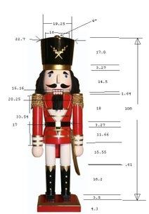 a wooden nutcracker is shown with measurements