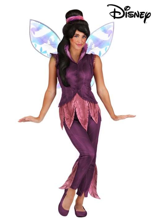 a woman dressed in a purple costume with a butterfly on her chest and wings, posing for the camera