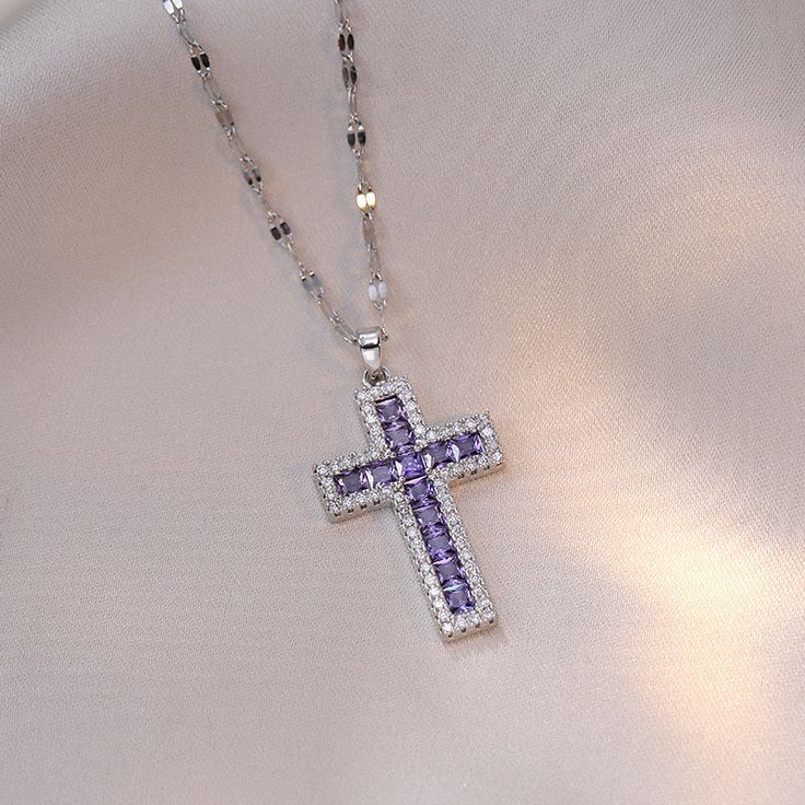 Description & Details Embrace the timeless symbol of faith, spirituality, and devotion with our exquisite pieces inspired by the sacred cross. Each design in our collection is meticulously crafted to honor the significance of the cross and serve as a beautiful reminder of one's beliefs and values. • Material: High Quality Titanium Steel ∙ Cubic Zirconia• Finish: Hypoallergenic ∙ Gold Plating• Dimensions: 40 - 45 cm chain, adjustable• All our work is custom made by hand with love Purple Cross Necklace, Purple Cross, Big Cross, Christian Quote, Timeless Symbol, Metal Cross, Purple Necklace, Couple Necklaces, Spring Fling