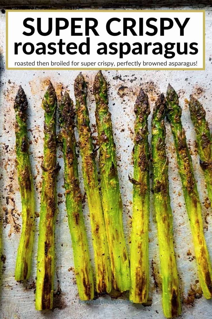 asparagus on a baking sheet with the title super crispy roasted asparagus