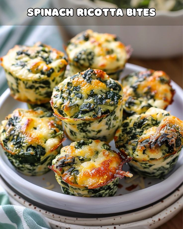 spinach ricotta bites on a plate with text overlay that reads spinach and ricotta bites