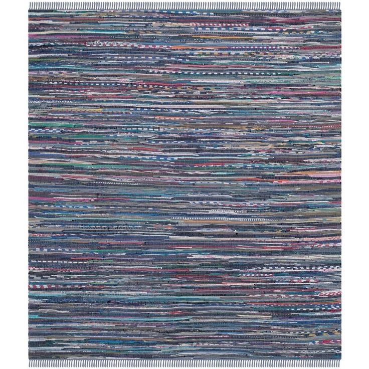 a multicolored rug with fringes on the top and bottom in different colors