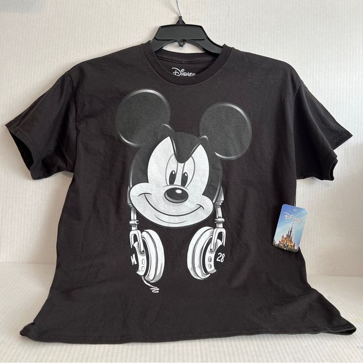 Measurements Armpit To Armpit Approximately 19” Shoulder To Hem 26” Black Disney Fan Merchandise T-shirt, Disney Black T-shirt With Character Print, Black Disney T-shirt For Fan Events, Black Disney Character Print T-shirt, Black Disney Tops With Cartoon Print For Fan Events, Black Mickey Mouse Tops For Disney Events, Black Disney Graphic Tee, Black Mickey Mouse Top For Disney Fan Events, Black Tops With Cartoon Print For Disney Fan Events