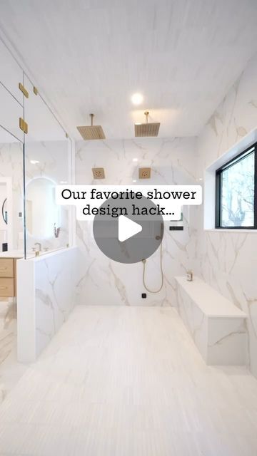 a bathroom with white marble walls and flooring that has the words our favorite shower design hack