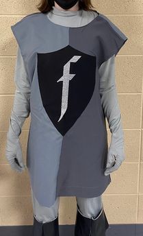 a person wearing a costume made to look like a knight