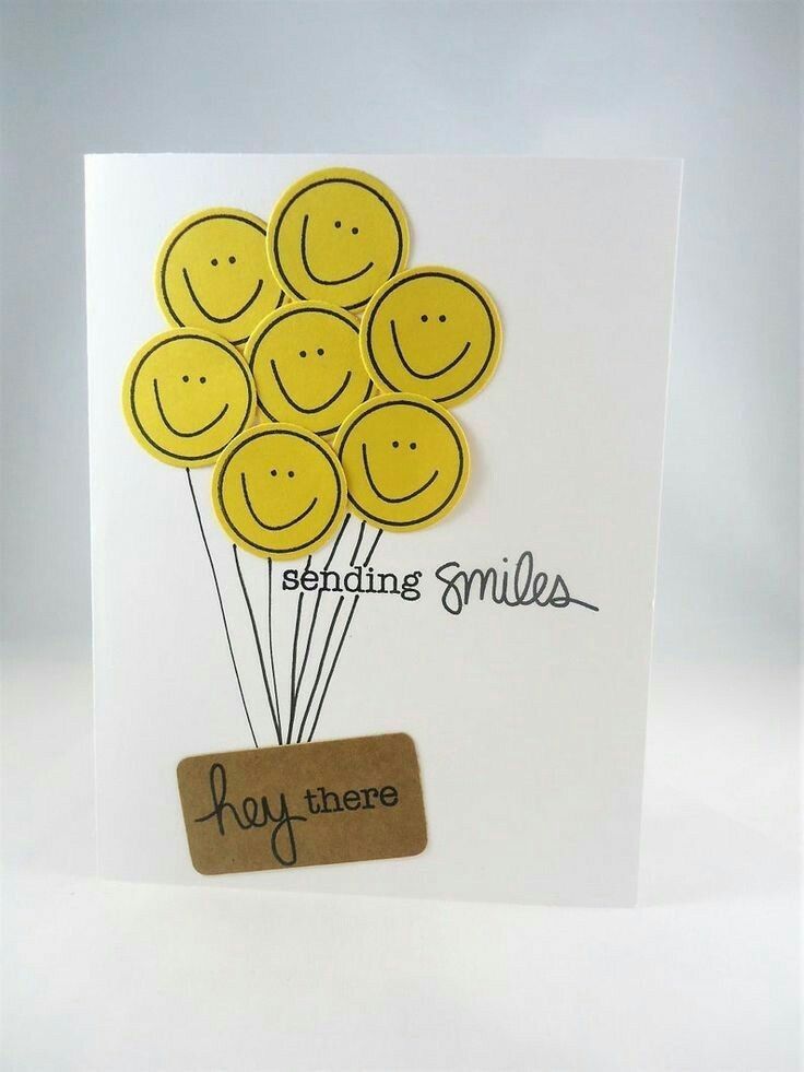 a greeting card with smiley faces on it