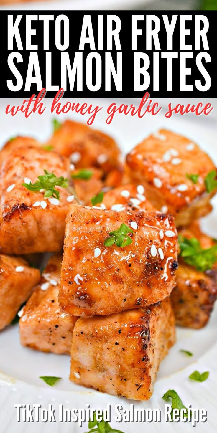 keto air fryer salmon bites with honey garlic sauce on a white platter