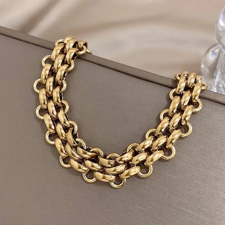 Introducing the Verity Bracelet in Gold - a chic and stylish addition to your jewelry collection. With a chunky cuban chain design, this bracelet adds a touch of sophistication to any outfit. Perfect for a date night or any occasion, it measures approximately 7.28" with a 1.18" extension. Elevate your look with the Verity Bracelet in Gold. Shop Small Saturday, Bracelet Pack, Packing Jewelry, Versatile Jewelry, Mors Dag, Chain Design, Handcrafted Necklace, Personalized Bracelets, Cuban Chain