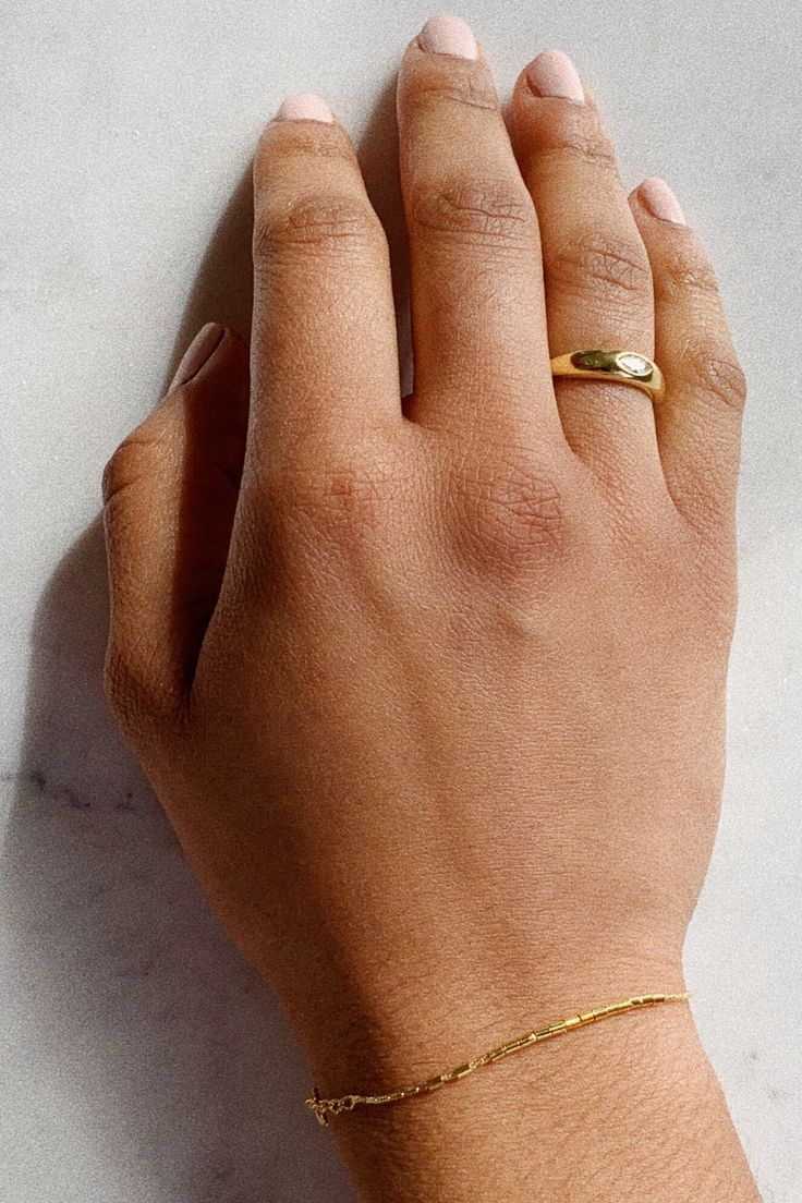 Deck out this dome gold ring and dainty chain bracelet Everyday Jewelry Gold, Yellow Gold Jewelry, 14k Gold Ring, Everyday Jewelry, Signet Ring, Modern Classic, Delicate Bracelet, Chain Bracelet, Classic Design