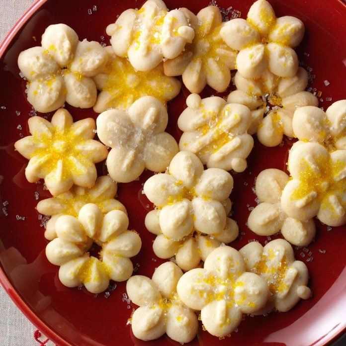 a red bowl filled with lemon meringue cookies