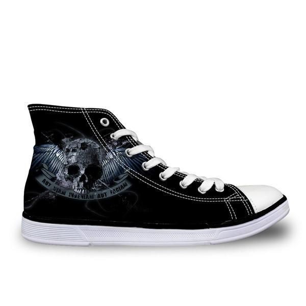 a black and white high top shoe with a skull on the side, featuring an eagle