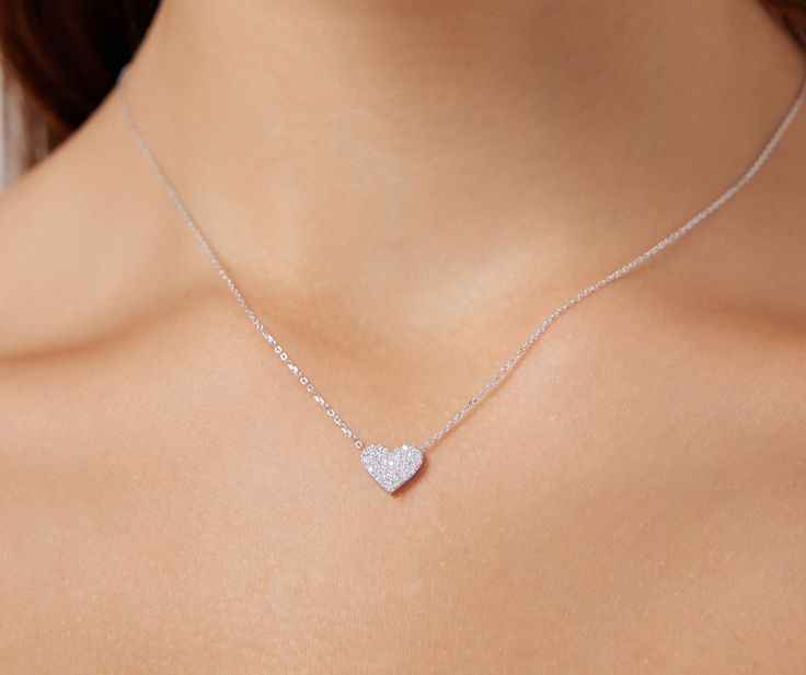 14K SOLID YELLOW GOLD DAINTY HEART NECKLACE WITH DIAMONDS Here is a dainty, delicate and simple, yet classy minimalist Heart Necklace. This is 14k Solid Gold. (We do not sell filled or plated jewelry) Perfect for everyday use. Metal : 14K Solid Gold Necklace Length : 17 inches / 42.5cm Heart Height : 6mm Heart Width : 7mm Diamond : 37 Diamonds --- Nice White Color Sparkle Diamonds ---- G-H color SI2 clarity Total Carat: 0.20ct ---MADE IN USA--- ---This is a beautiful 14K Solid White Gold Heart N Diamond Heart Necklace, White Gold Heart Necklace, Gold Diamond Heart Necklace, Diamond Initial Necklace, Heart Necklace Diamond, Solid Gold Necklace, Gold Heart Necklace, Jewelry Accessories Ideas, Diamond Heart