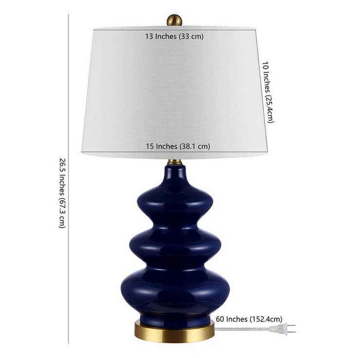 a blue table lamp with a white shade