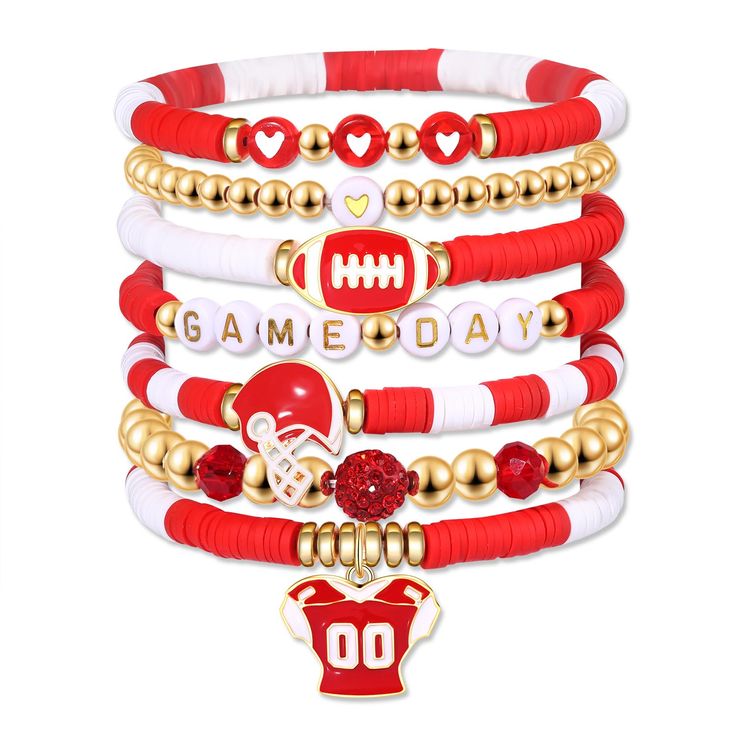 a stack of red and white bracelets with football charms