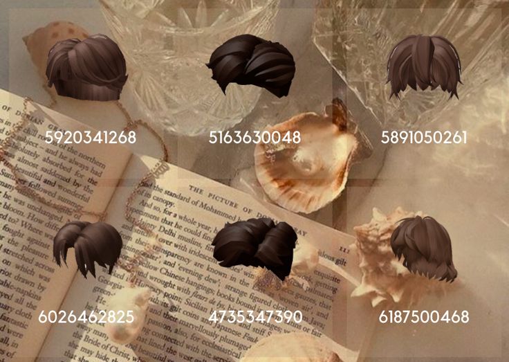 several different types of hair on top of an open book with pages in the background